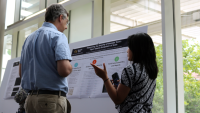 People attending a scientific software poster session hosted by IDEaS and the OSPO at Georgia Tech